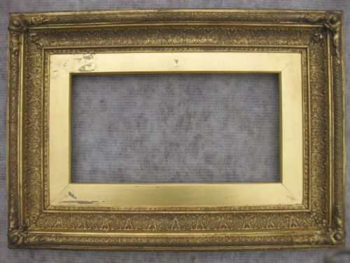 A Good Quality Antique Circa 1880 Gilt Gold Leaf Picture Frame to Fit 8" X 15" with All Round Running Decoration, Corners and Slip.