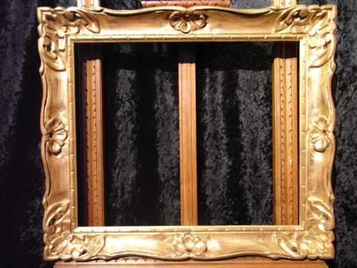Early 20th Century 16" X 20" Carved Gilt Gold Wood Picture Frame with Rococo Style Corners and Centres.