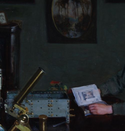 fig 3. An oil painting depicting a young blonde boy seated at a dark wooden desk with scientific equipment, a brass microscope, and an open book.