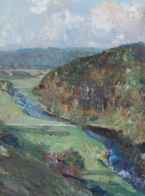 fig 3. An impressionistic landscape oil painting depicting a river winding through green hills, framed within an ornate swept gilt border.