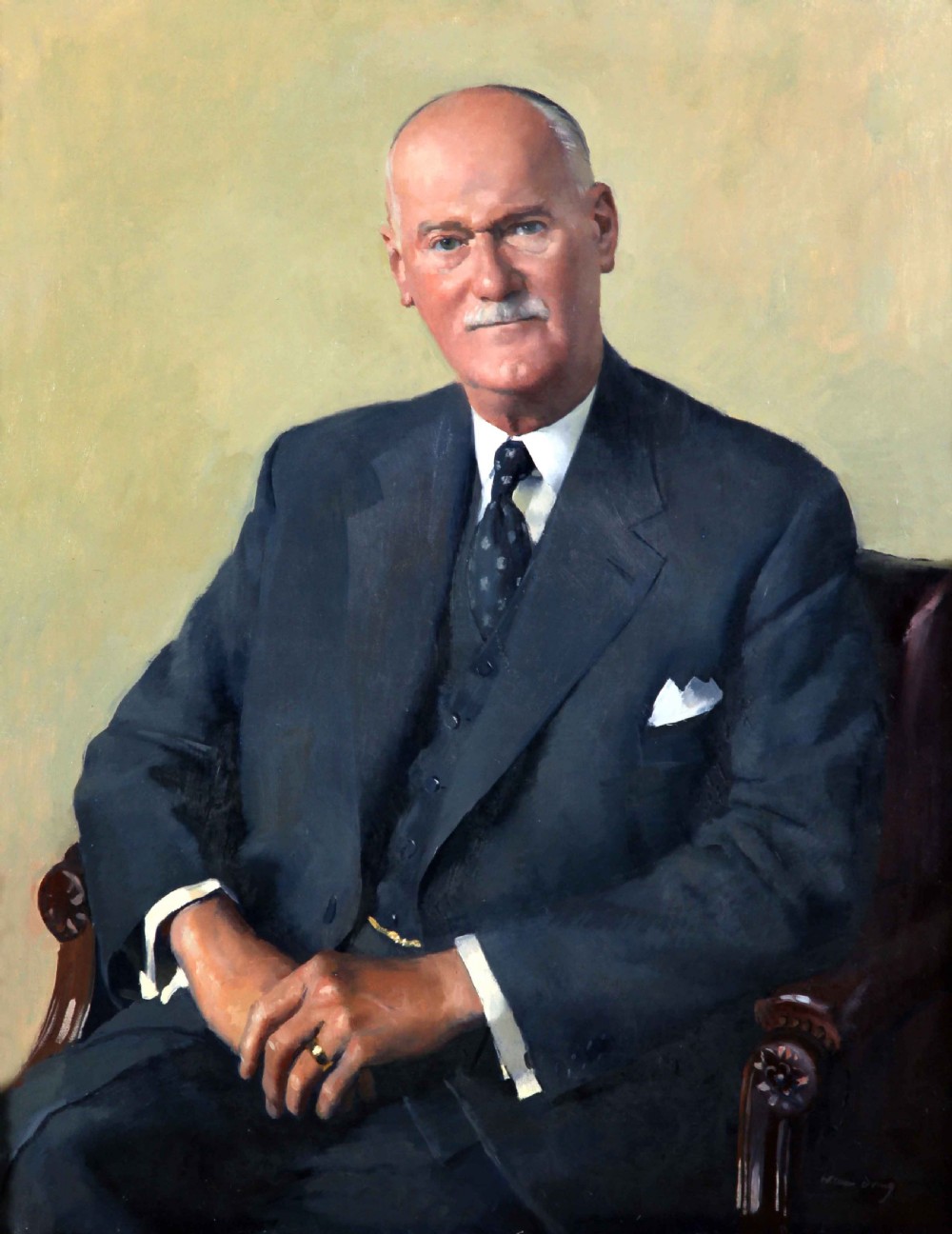 An oil portrait on canvas depicting a seated gentleman named Arthur Howell wearing a dark navy three-piece suit against a light yellow background.