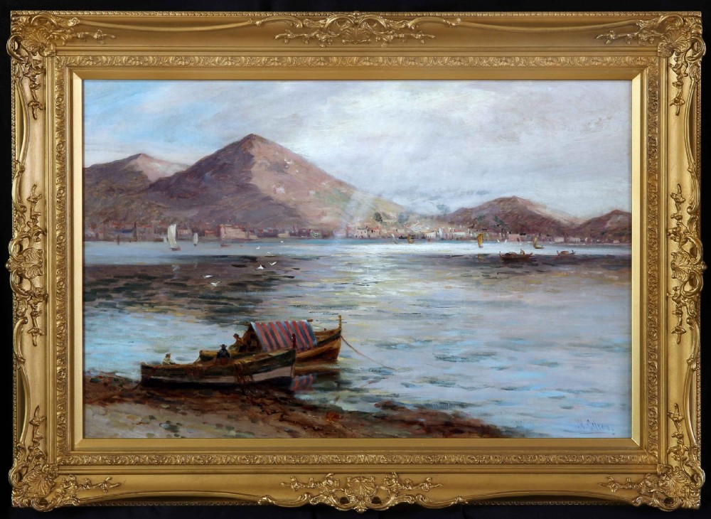 An antique oil painting depicting small fishing boats anchored along a Mediterranean shoreline with a mountain backdrop and coastal town in the distance. View II