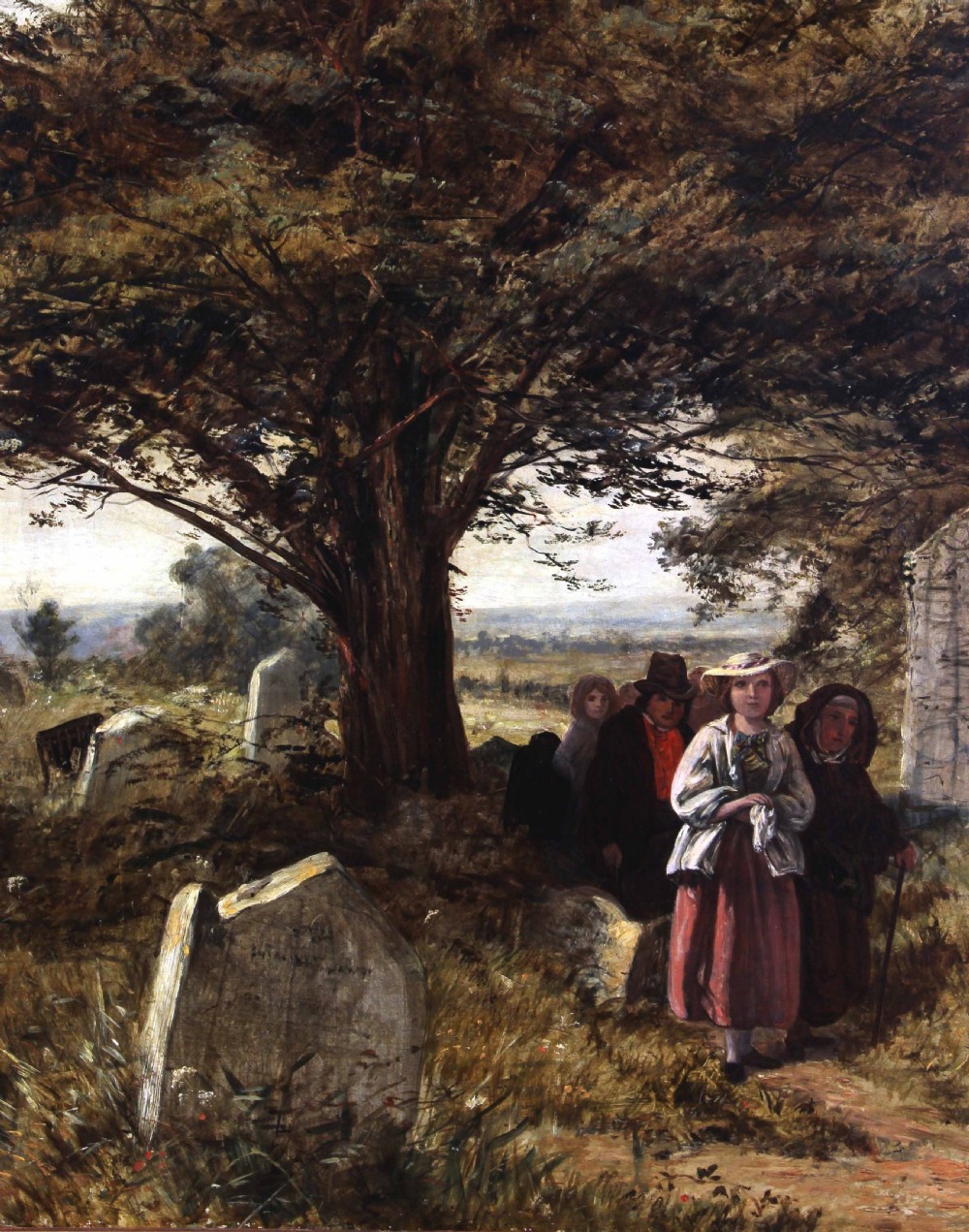 A large Victorian oil painting depicting rural figures walking along a path past a churchyard framed in an elaborate gilt frame. View V
