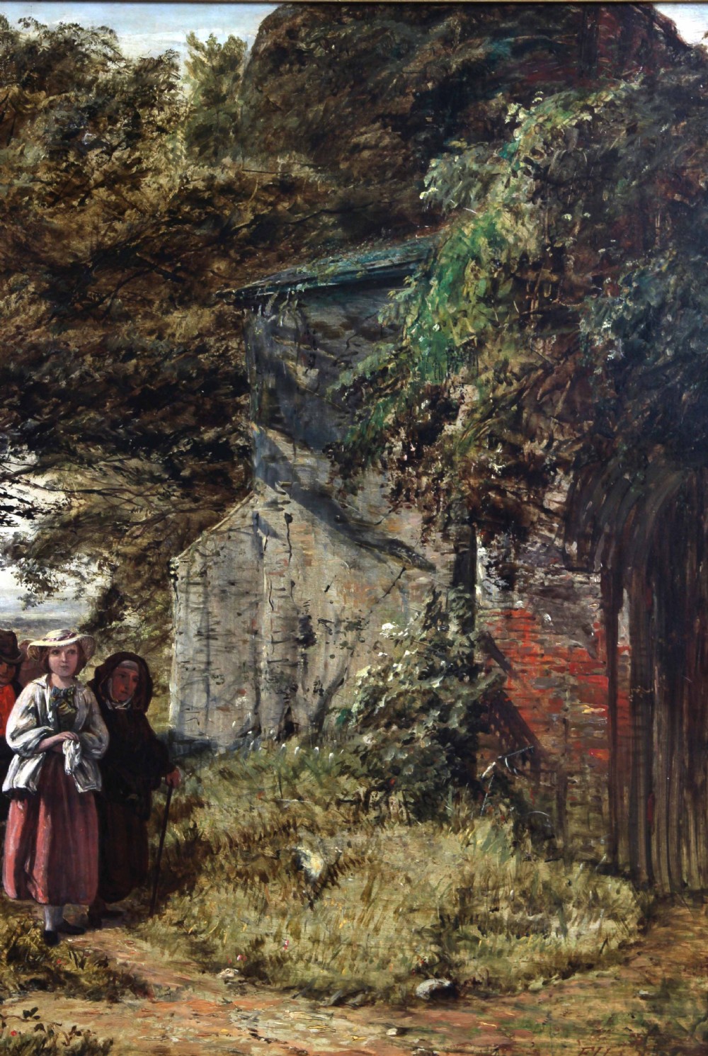 A large Victorian oil painting depicting rural figures walking along a path past a churchyard framed in an elaborate gilt frame. View VII