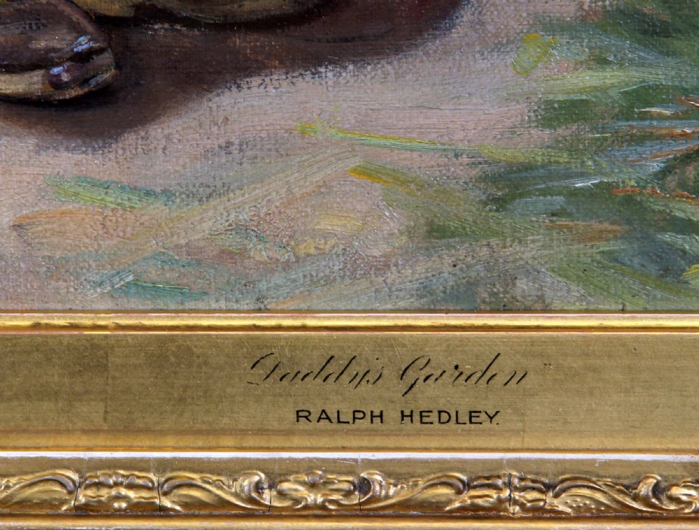 An antique oil painting depicting a young blonde girl holding a flower beside a rose bush in a ornate gilded gesso frame. View X