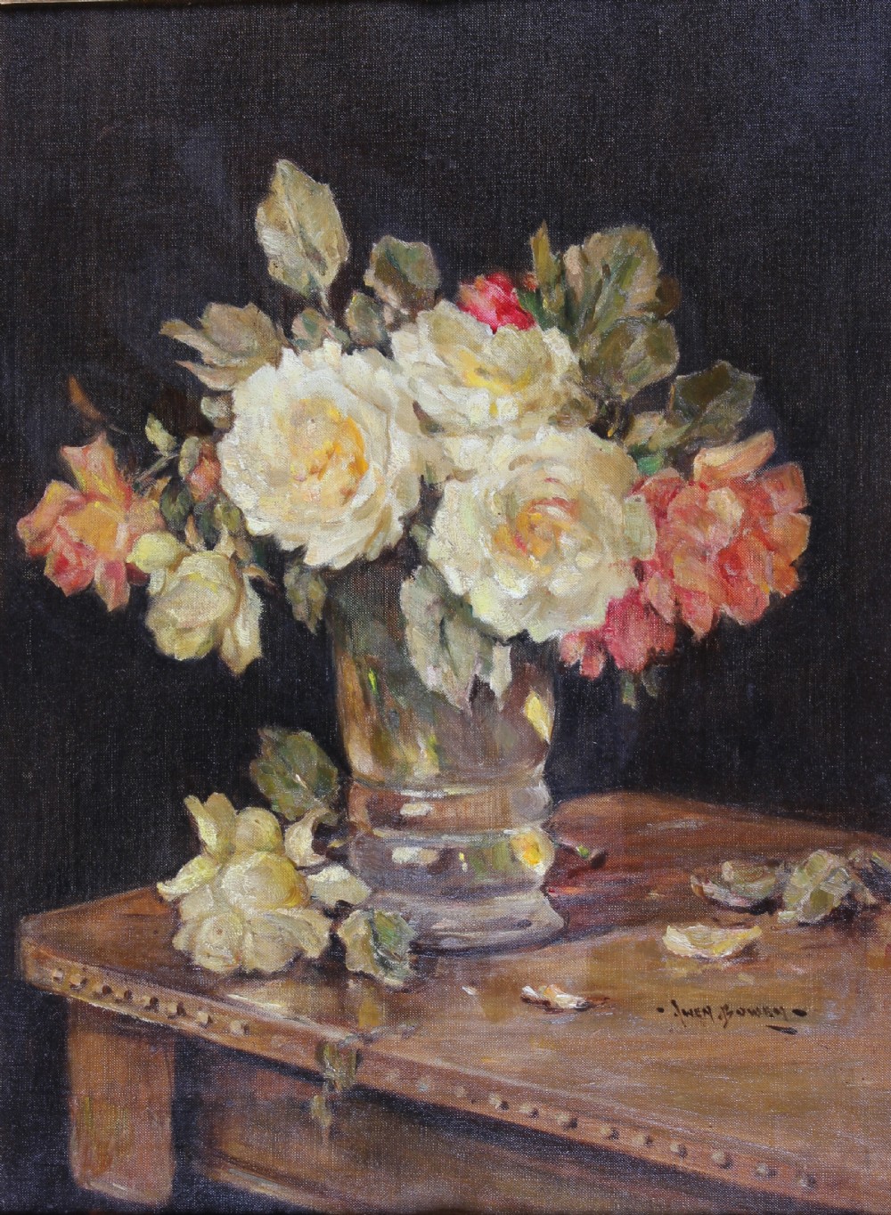 A still life oil painting depicting a vase of white, yellow, and pink roses arranged on a wooden table surface against a dark background.