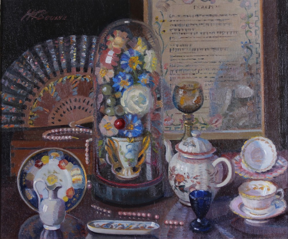 A still life oil painting depicting an arrangement of household objects including a glass cloche with flowers, teacups, a teapot, a folding fan, and a framed script.