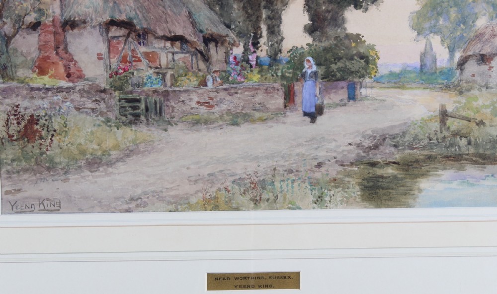 A framed 19th-century watercolour painting depicting a thatched cottage along a rural dirt road in Sussex, presented in an ornate gilt frame. View III