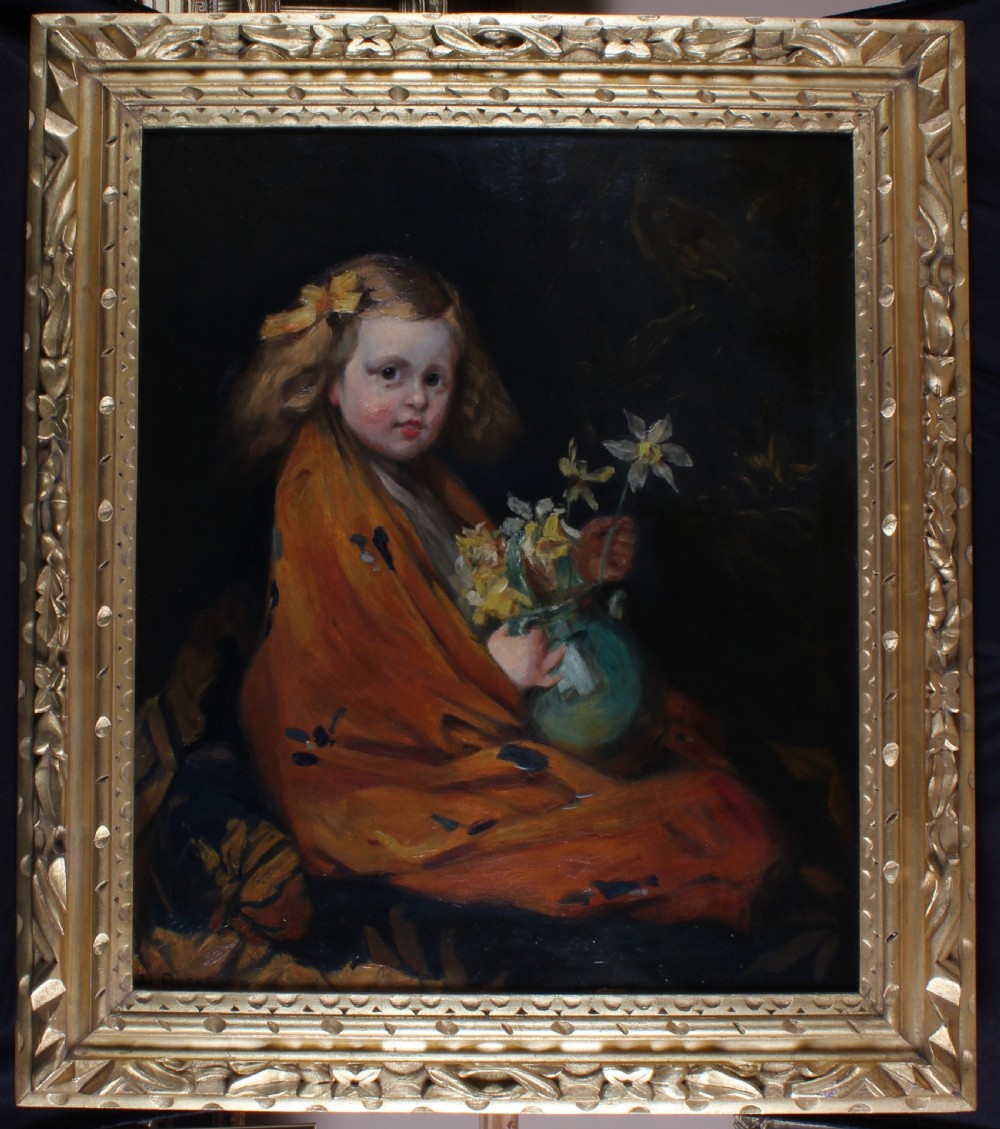 An antique oil painting depicting a young girl draped in a warm orange shawl holding a jug of flowers, enclosed within a carved gilded frame.