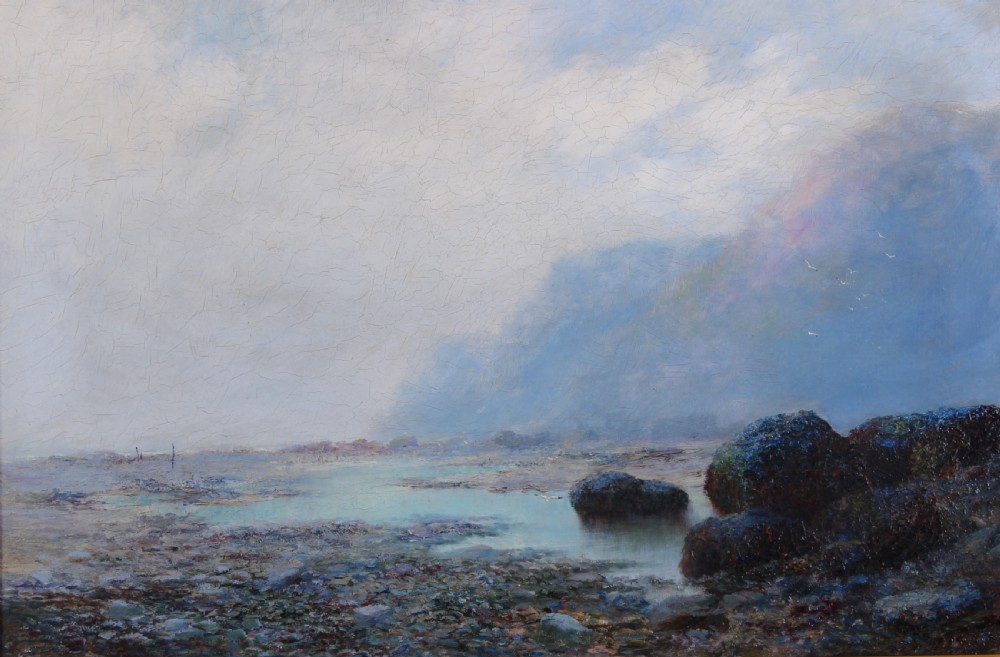 An antique oil painting depicting a hazy coastal tide pool scene with dark rocky outcrops, soft mist-covered cliffs, and an overcast sky.