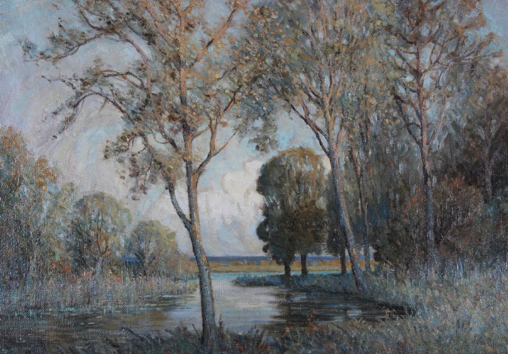 A large impressionistic oil painting depicting a calm lake surrounded by tall leafy trees, set within an ornate gilded frame. View V