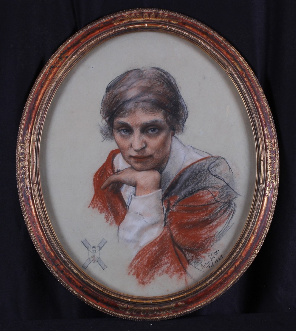 An oval framed 1920s charcoal and watercolour portrait drawing depicting a woman in academic regalia, signed by Robin Watt in 1924. View VI