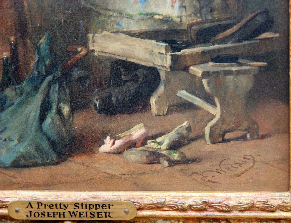 A pair of 19th-century narrative oil paintings depicting interior genre scenes, presented in ornate swept giltwood frames. View XII