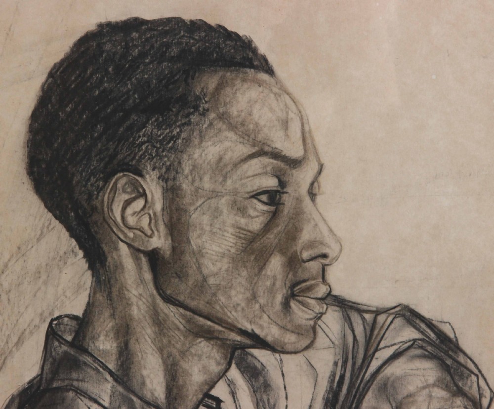 A framed charcoal and pencil profile portrait drawing depicting a young man leaning his arm on a surface against a light background. View IV