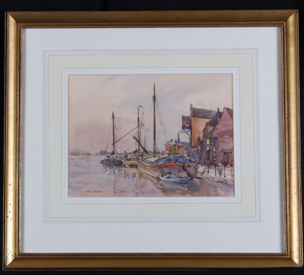 An original 1929 watercolour painting depicting moored boats alongside harbour buildings in Lincoln by artist Fred Lawson. View II