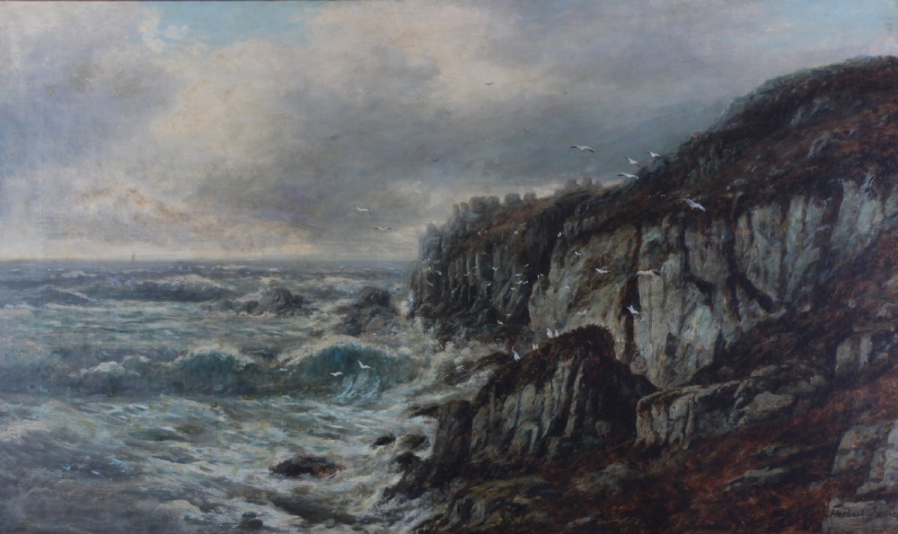 A coastal oil painting depicting turbulent sea waves crashing against dark rocky cliffs beneath a cloudy sky with flying seagulls.