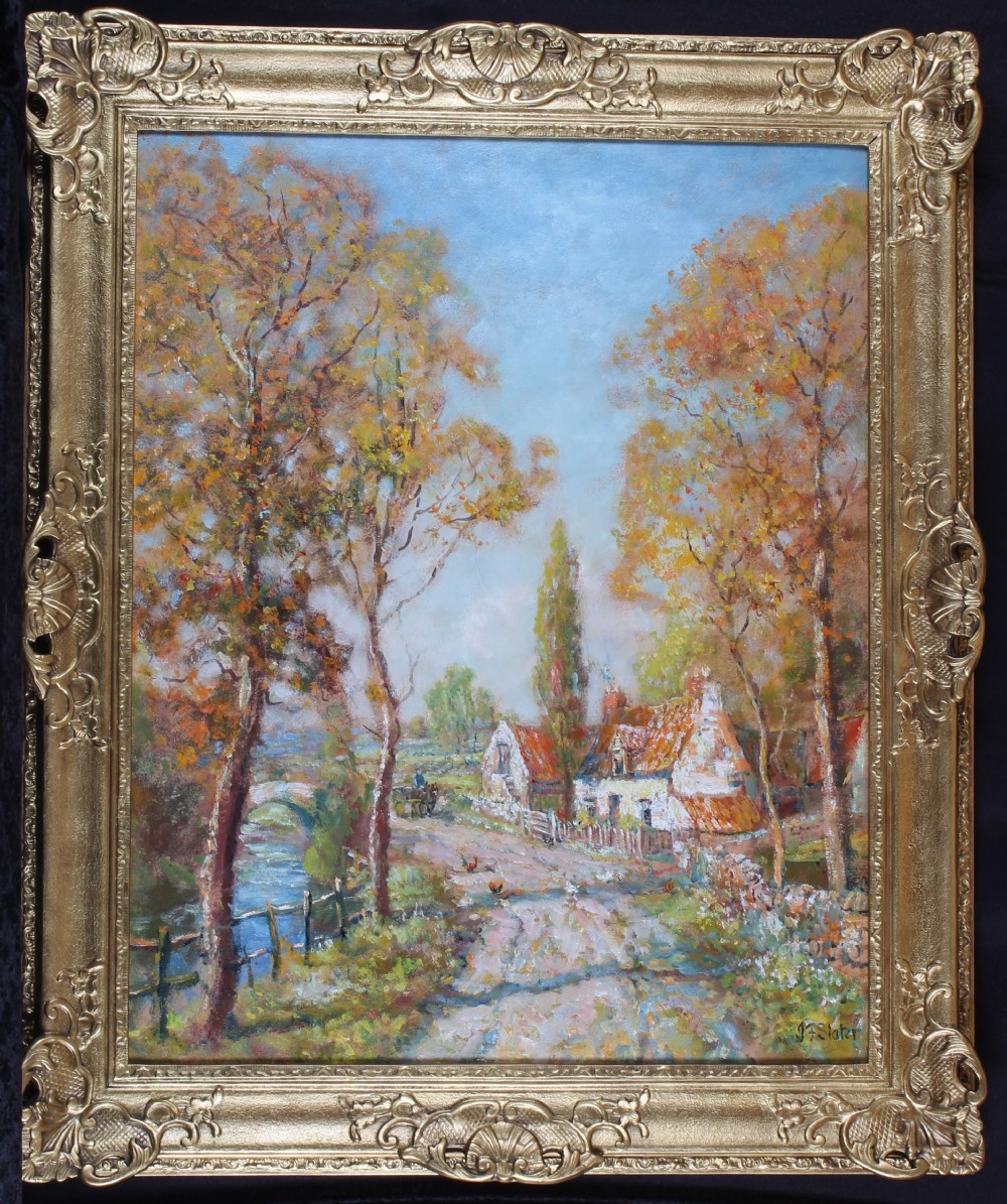 An impressionistic oil painting depicting a rural lane lined with autumn trees and cottages, housed within an ornate swept gilt frame.
