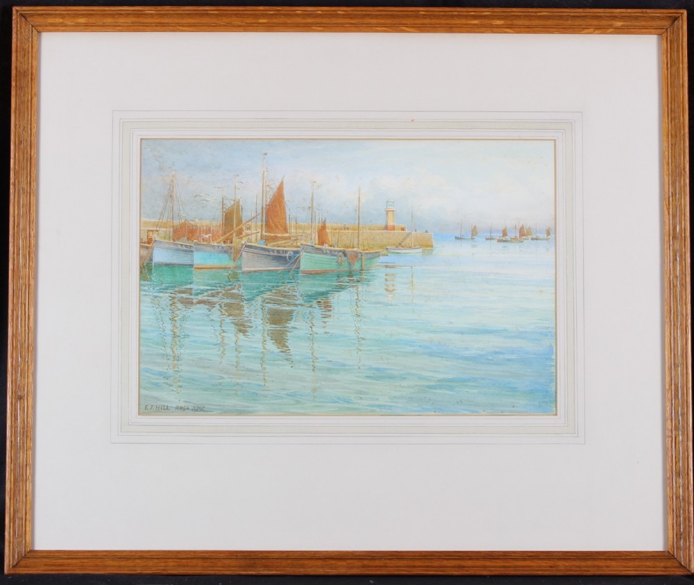 A marine watercolour painting depicting traditional fishing boats moored in St Ives harbour near a stone lighthouse under a soft blue sky. View II
