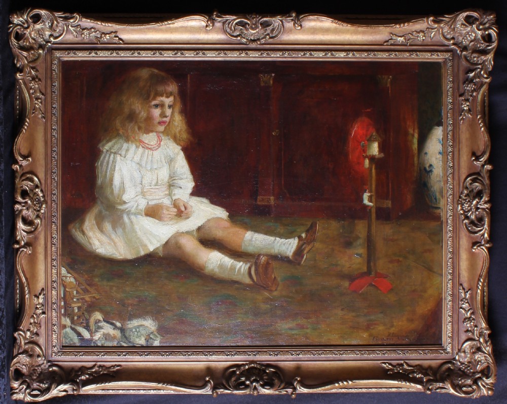 An antique oil painting depicting a young girl in a white dress seated on a carpeted floor next to a mechanical toy, set within an ornate gilded frame.