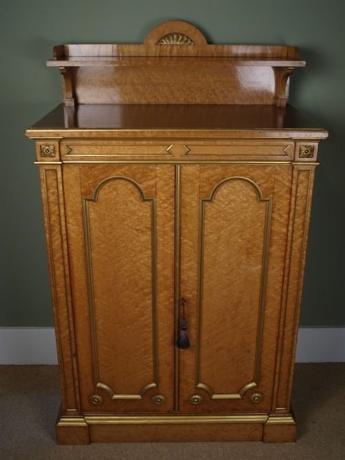 A Fine Victorian Birdseye Maple & Gilded Cabinet