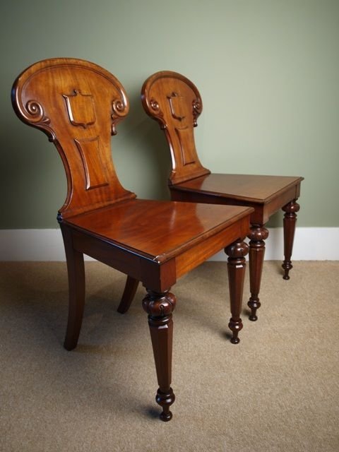 A Pair of Victorian Mahogany Hall Chairs