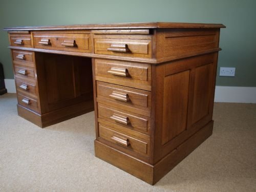 An Impressive Large Oak Pedestal Desk