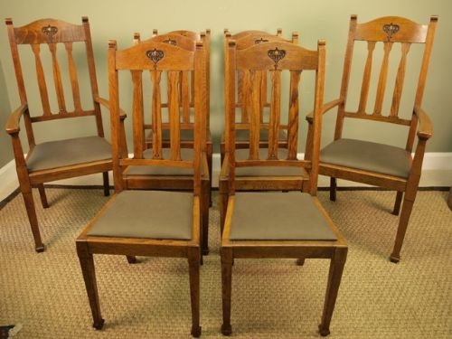 fig 1. A Set of 8 Oak Dining Chairs by Shoolbred