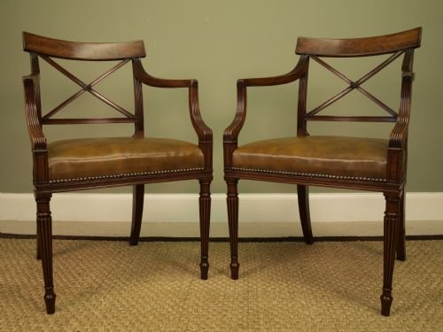 A Pair of George III Mahogany Elbow Chairs
