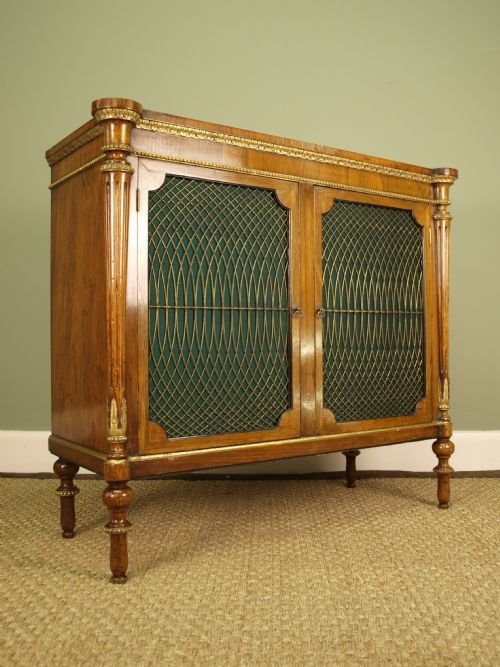 fig 1. A Dwarf Rosewood and Gilded Side Cabinet