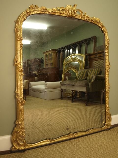 A Large Highly Decorative Victorian Giltwood Mirror