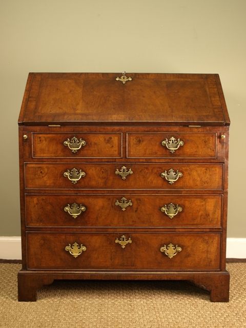 fig 1. A George II Walnut Bureau