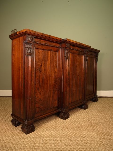 fig 1. A Fine George IV Rosewood Breakfront Cabinet.