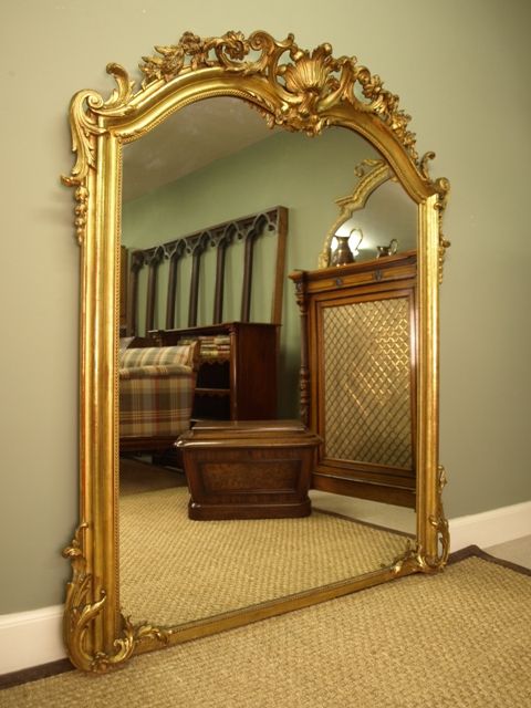 A Large Ornate Victorian Giltwood Mirror