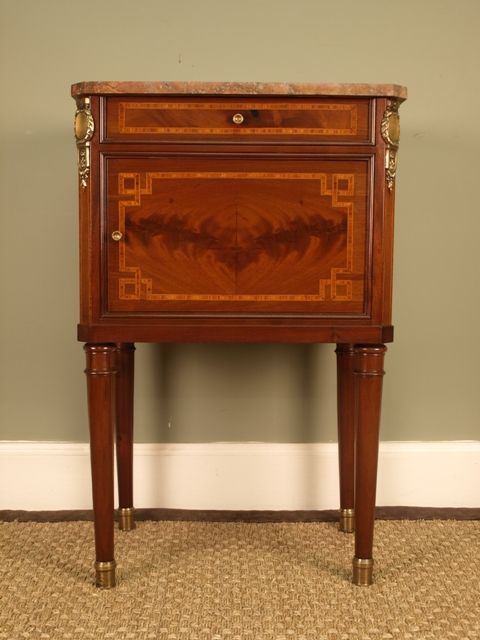 A Beautiful French Inaid Mahogany Cabinet