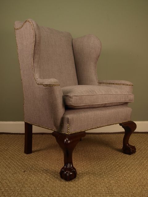 A Large Edwardian Upolstered Wing Chair
