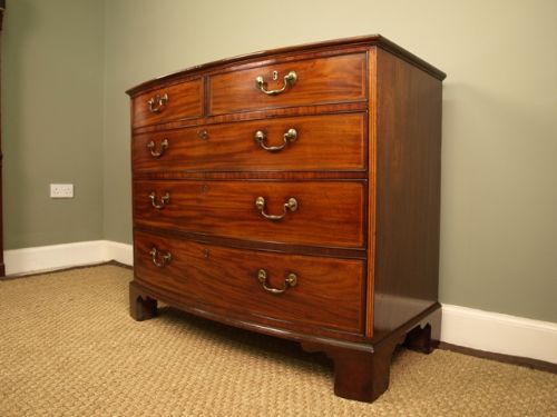 A Superb George III Inlaid Mahogany Bow Front Chest of Drawers