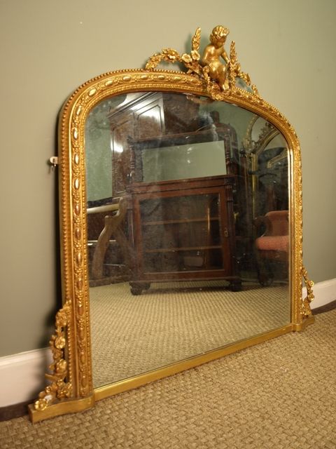 A Victorian Giltwood Cherub Overmantel Mirror
