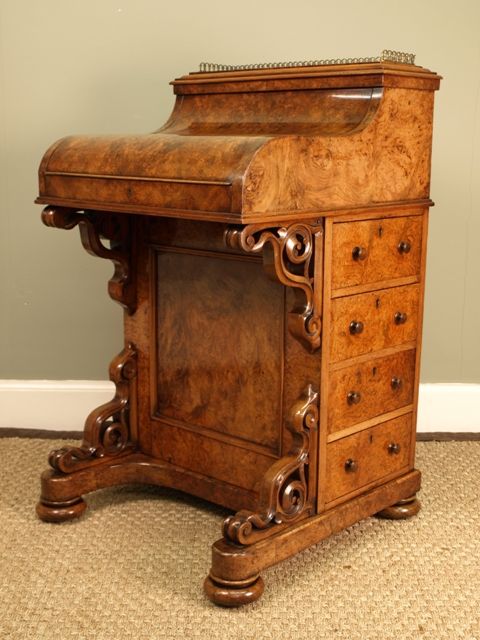 A Superb Victorian Figured Walnut Pop-up Davenport