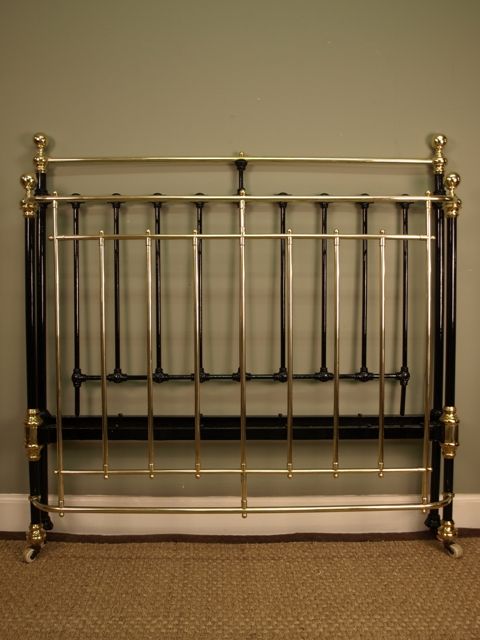 A Victorian 4ft-6 (Double) Bow End Brass & Iron Bed