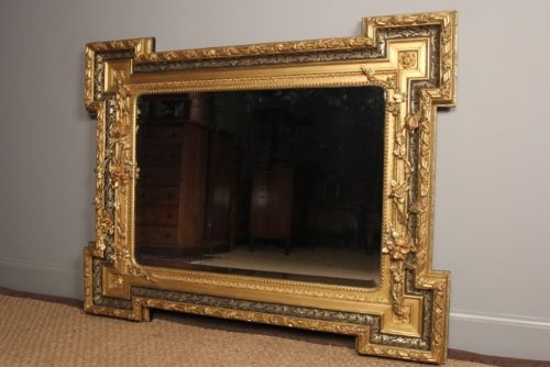A Spectacular Italian Giltwood Mirror