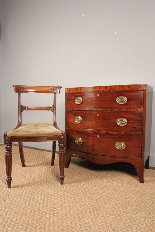 A Very Small Bow Front Chest of Drawers