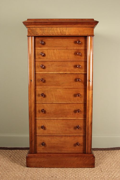 A Superb Figured Walnut Wellington Chest