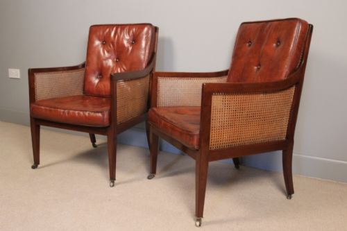 A Superb Pair of Leather Bergere Library Chairs