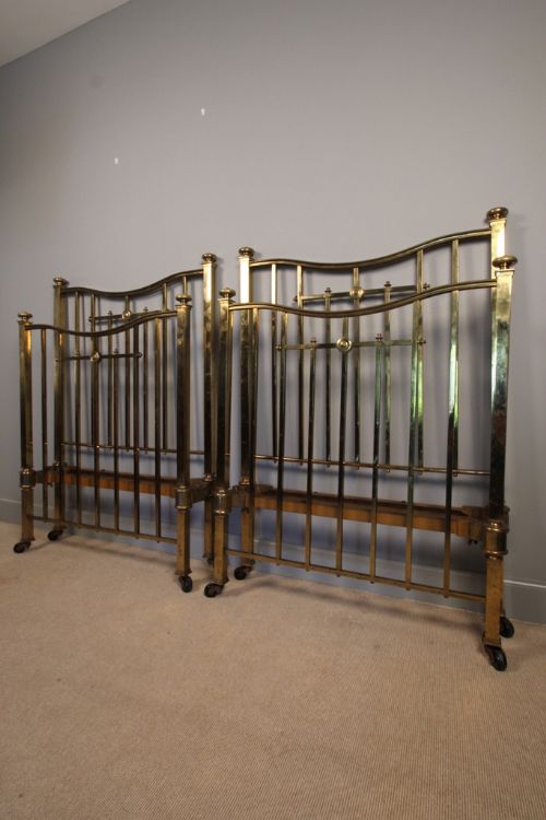 A Pair of American Twin Brass Beds