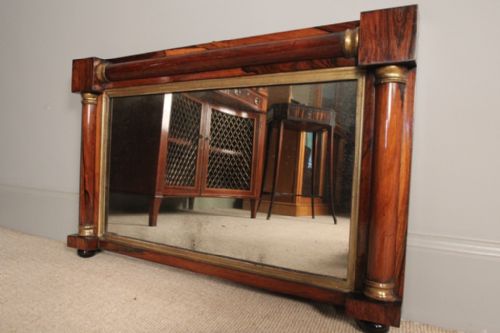 
A Small Rosewood & Giltwood Mirror