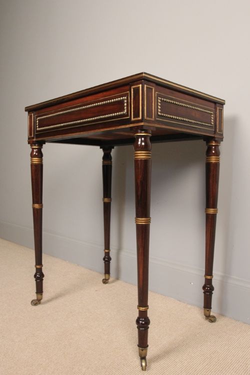 A Regency Rosewood & Parcel Gilded Writing Table