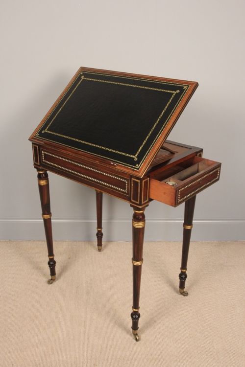 fig 1. A Regency Rosewood & Parcel Gilded Writing Table