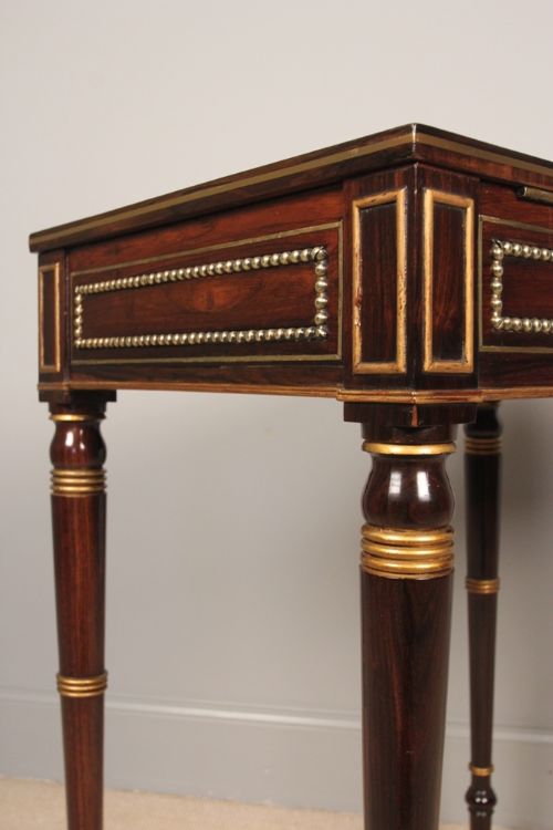 fig 2. A Regency Rosewood & Parcel Gilded Writing Table