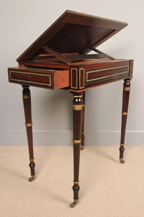 fig 5. A Regency Rosewood & Parcel Gilded Writing Table
