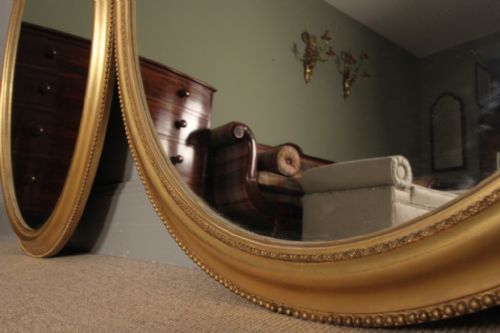 fig 3. A Pair of Giltwood Oval Mirrors